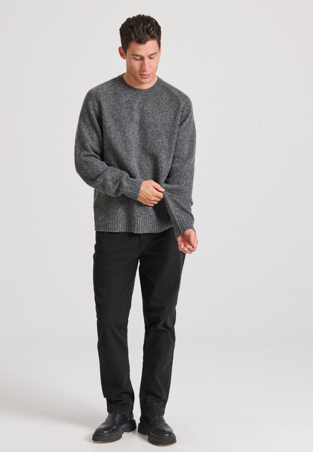 Relaxed fit πλεκτή μπλούζα σε μελανζέ πλέξη